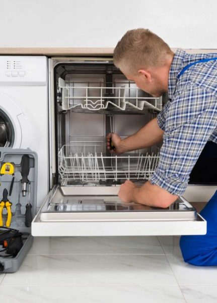 technician fixing a dishwasher repair raleigh